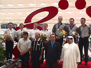 Men's Doubles Medalists with Officials