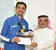Champion receiving trophy