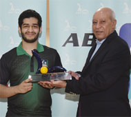 Champion receiving trophy